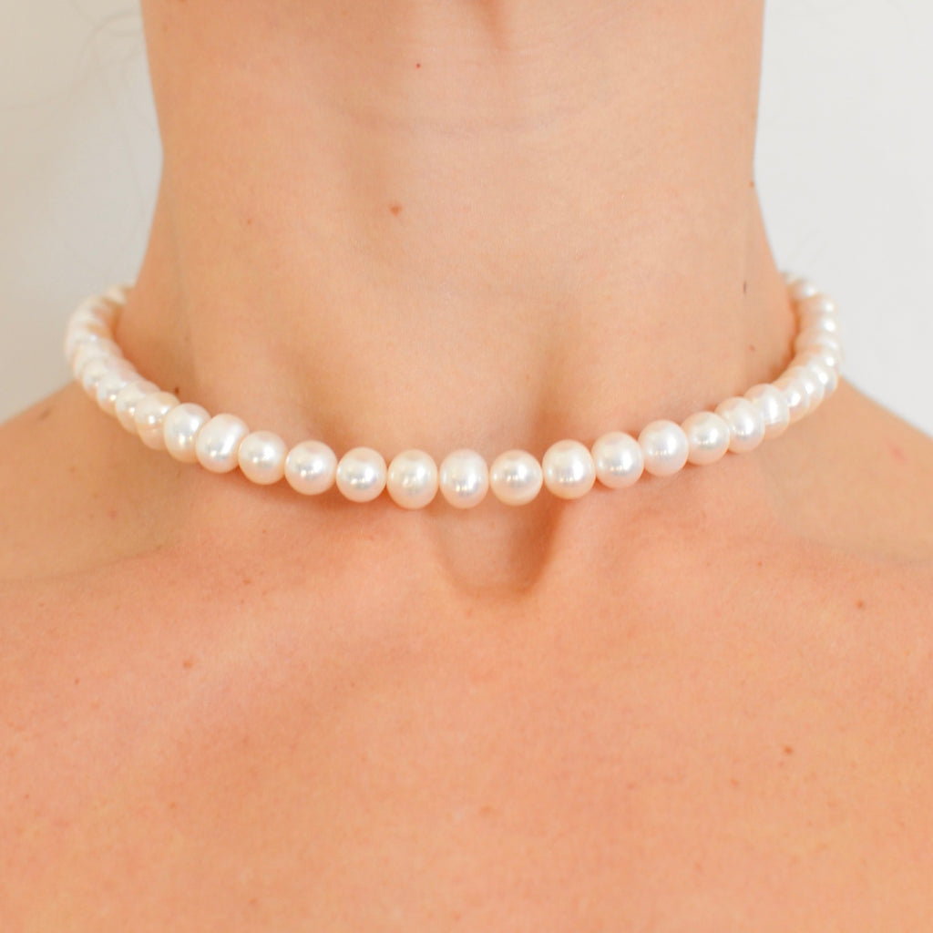 Girocollo perle tonde diam o,80 naturali con chiusura moschettone tondo
